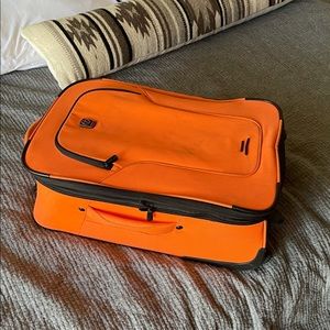 Tumi tech carry on rolling suitcase